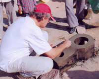 cordens bruno making stove by volunteer